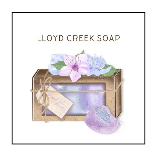 Logo for "Lloyd Creek Soap" featuring a decorative soap box with floral accents and elegant minimalist text.